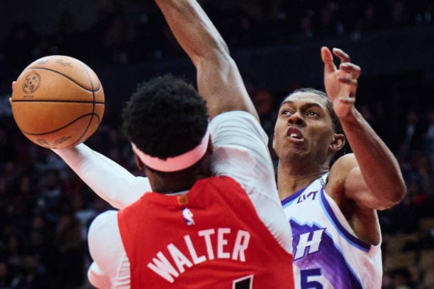 February 1, 2026, Toronto, On, Canada: Utah Jazz s Cody Williams (5) is blocked at the net by Toronto Raptors Ja Kobe Walter (14) during first half NBA, Basketball Herren, USA basketball action in Toronto, on Sunday, Feb. 1, 2026. Canada News - February 1, 2026 - ZUMAc35_ 20260201_zaf_c35_082 Copyright: xSammyxKoganx