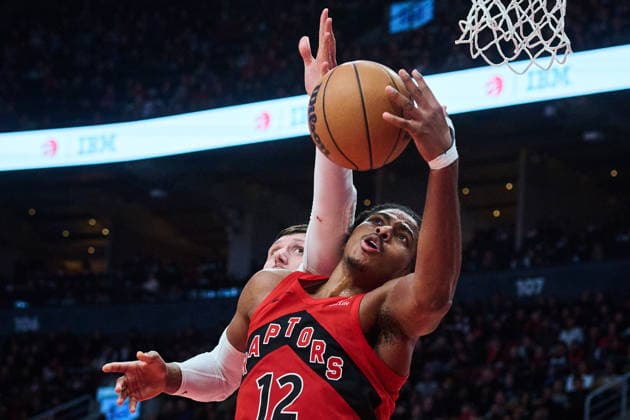 February 1, 2026, Toronto, On, Canada: Toronto Raptors Collin Murray-Boyles (12) and Utah Jazz s Jusuf Nurkic (30) vie for control of the ball during second half NBA, Basketball Herren, USA basketball action in Toronto, on Sunday, Feb. 1, 2026. Canada News - February 1, 2026 - ZUMAc35_ 20260201_zaf_c35_100 Copyright: xSammyxKoganx