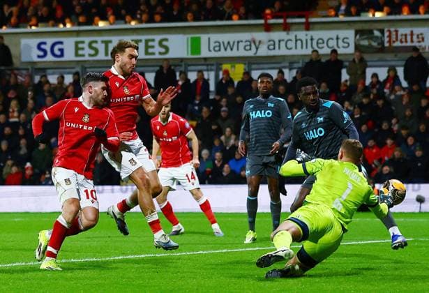 Josh Windass of Wrexham scores the opening goal Wrexham v Ipswich Town, Emirates FA Cup, Fourth Round, Football, SToK Cae Ras, Wrexham, UK - 13 Feb 2026Wrexham SToK Cae Ras United Kingdom EDITORIAL USE ONLY No use with unauthorised audio, video, data, fixture lists, club league logos or live services. Online in-match use limited to 120 images, no video emulation. No use in betting, games or single club league player publications. Copyright: xMattxWest Shutterstockx 16593547as