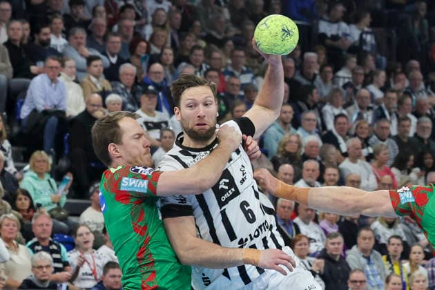 Felix Claar SC Magdeburg and Harald Reinkind THW Kiel battle for the ball, DAIKIN Handball Bundesliga, THW Kiel v SC Magdeburg, Wunderino Arena on February 15, 2026 in Kiel, Germany Photo by Marco Steinbrenner DeFodi Images Felix Claar SC Magdeburg and Harald Reinkind THW Kiel battle for the ball, DAIKIN Handball Bundesliga, THW Kiel v SC Magdeburg, Wunderino Arena, February 15, 2026 in Kiel, Germany Photo by Marco Steinbrenner DeFodi Images