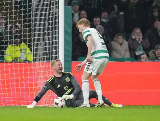 Celtic goalkeeper Kasper Schmeichel reacts with Liam Scales of Celtic after diving to stop a certain own-goal from a poor touch by Liam Scales of Celtic. Celtic v Stuttgart, UEFA Europa League, Knockout Round Play Offs, First Leg, Football, Celtic Park, Glasgow, Scotland, UK - 19 Feb 2026Glasgow Celtic Park Scotland United Kingdom EDITORIAL USE ONLY No use with unauthorised audio, video, data, fixture lists, club league logos or live services. Online in-match use limited to 120 images, no video emulation. No use in betting, games or single club league player publications. Copyright: xStuartxWallace Shutterstockx 16674319bh