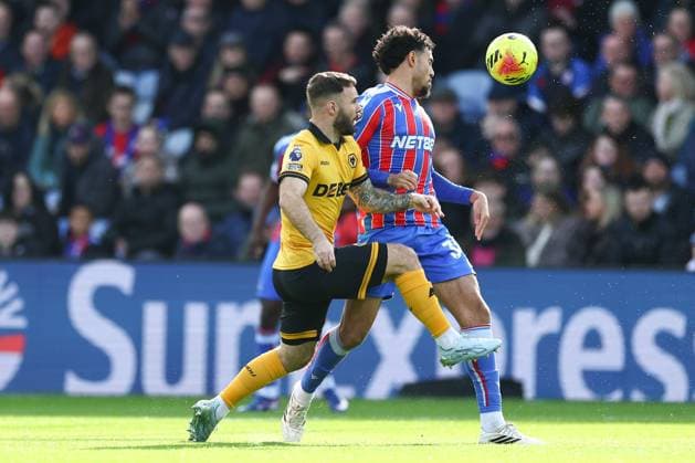 Chadi Riad of Crystal Palace under pressure from Adam Armstrong of Wolverhampton Wanderers Crystal Palace v Wolverhampton Wanderers, Premier League, Football, Selhurst Park, London, UK - 22 Feb 2026London Selhurst Park United Kingdom EDITORIAL USE ONLY No use with unauthorised audio, video, data, fixture lists, club league logos or live services. Online in-match use limited to 120 images, no video emulation. No use in betting, games or single club league player publications. Copyright: xSimonxDael Shutterstockx 16681548z