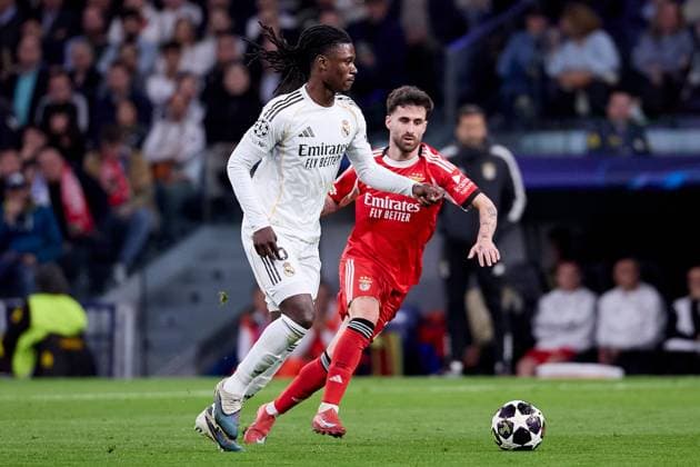 Eduardo Camavinga of Real Madrid CF and Rafa of Benfica Real Madrid v Benfica, UEFA Champions League, Play-off, Leg 2, Football, Estadio Bernabeu, Madrid, Spain - 25 Feb 2026Madrid Estadio Bernabeu Spain EDITORIAL USE ONLY No use with unauthorised audio, video, data, fixture lists, club league logos or live services. Online in-match use limited to 120 images, no video emulation. No use in betting, games or single club league player publications. Copyright: xRubenxAlbarran Shutterstockx 16703182an