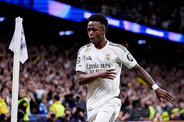 Vinicius Jr of Real Madrid CF celebrates after scoring a goal Real Madrid v Benfica, UEFA Champions League, Play-off, Leg 2, Football, Estadio Bernabeu, Madrid, Spain - 25 Feb 2026Madrid Estadio Bernabeu Spain EDITORIAL USE ONLY No use with unauthorised audio, video, data, fixture lists, club league logos or live services. Online in-match use limited to 120 images, no video emulation. No use in betting, games or single club league player publications. Copyright: xRubenxAlbarran Shutterstockx 16703182cj
