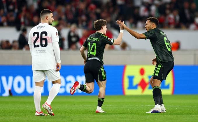 Luke McCowan of Celtic celebrates scoring a goal after making the score 0-1. Stuttgart v Celtic, UEFA Europa League, Knockout Round Play Offs, Second Leg, Football, MHP Arena, Stuttgart, Germany - 26 Feb 2026Stuttgart MHP Arena Germany EDITORIAL USE ONLY No use with unauthorised audio, video, data, fixture lists, club league logos or live services. Online in-match use limited to 120 images, no video emulation. No use in betting, games or single club league player publications. Copyright: xJamesxMarsh Shutterstockx 16701577ao