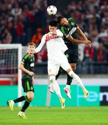 Auston Trusty of Celtic and Atakan Karazor of Stuttgart. Stuttgart v Celtic, UEFA Europa League, Knockout Round Play Offs, Second Leg, Football, MHP Arena, Stuttgart, Germany - 26 Feb 2026Stuttgart MHP Arena Germany EDITORIAL USE ONLY No use with unauthorised audio, video, data, fixture lists, club league logos or live services. Online in-match use limited to 120 images, no video emulation. No use in betting, games or single club league player publications. Copyright: xJamesxMarsh Shutterstockx 16701577bm