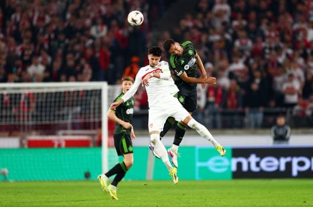 Auston Trusty of Celtic and Atakan Karazor of Stuttgart. Stuttgart v Celtic, UEFA Europa League, Knockout Round Play Offs, Second Leg, Football, MHP Arena, Stuttgart, Germany - 26 Feb 2026Stuttgart MHP Arena Germany EDITORIAL USE ONLY No use with unauthorised audio, video, data, fixture lists, club league logos or live services. Online in-match use limited to 120 images, no video emulation. No use in betting, games or single club league player publications. Copyright: xJamesxMarsh Shutterstockx 16701577bp