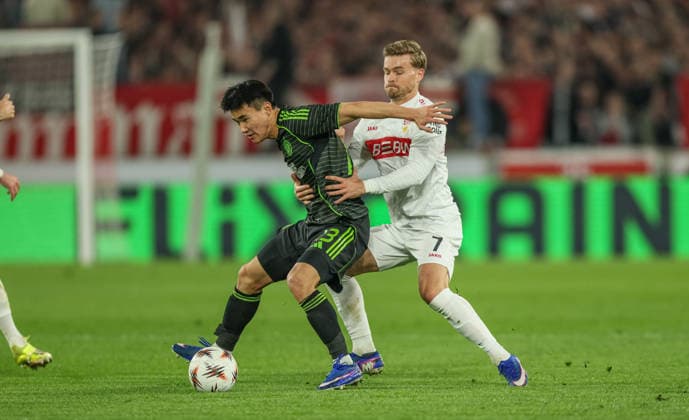 GER, Stuttgart, VfB Stuttgart vs Celtic Glasgow, Europa League, Football, UEFA, Season 2025 2026, MHP Arena, Playoffs, Second leg in picture v l Hyunjun Yang Celtic Glasgow 13 , Maximilian Mittelstädt VfB Stuttgart 7 DFB DFL REGULATIONS PROHIBIT ANY USE OF PHOTOGRAPHS AS IMAGE SEQUENCES AND OR QUASI VIDEO, 26 02 2026 Copyright: HMBxMedia HendrikxHamelau