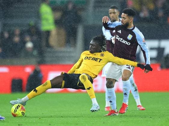 Mateus Mane of Wolverhampton Wanderers is fouled by Douglas Luiz of Aston Villa Wolverhampton Wanderers v Aston Villa, Premier League, Football, Molineux, Wolverhampton, UK - 27 Feb 2026Wolverhampton Molineux United Kingdom EDITORIAL USE ONLY No use with unauthorised audio, video, data, fixture lists, club league logos or live services. Online in-match use limited to 120 images, no video emulation. No use in betting, games or single club league player publications. Copyright: xMichaelxZemanek Shutterstockx 16701657c