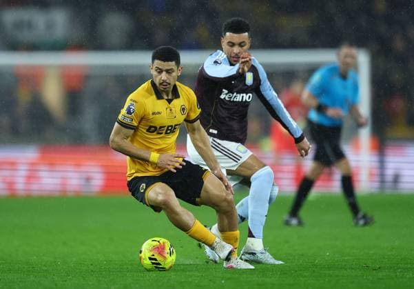 Andre of Wolverhampton Wanderers and Morgan Rogers of Aston Villa Wolverhampton Wanderers v Aston Villa, Premier League, Football, Molineux, Wolverhampton, UK - 27 Feb 2026Wolverhampton Molineux United Kingdom EDITORIAL USE ONLY No use with unauthorised audio, video, data, fixture lists, club league logos or live services. Online in-match use limited to 120 images, no video emulation. No use in betting, games or single club league player publications. Copyright: xMichaelxZemanek Shutterstockx 16701657p