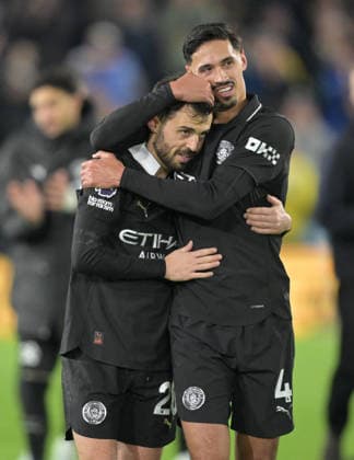 Bernardo Silva and Tijjani Reijnders of Manchester City celebrate at the end of the game Leeds United v Manchester City, Premier League, Football, Elland Road, Leeds, UK - 28 Feb 2026Leeds Elland Road United Kingdom EDITORIAL USE ONLY No use with unauthorised audio, video, data, fixture lists, club league logos or live services. Online in-match use limited to 120 images, no video emulation. No use in betting, games or single club league player publications. Copyright: xGreigxCowie Shutterstockx 16708637av