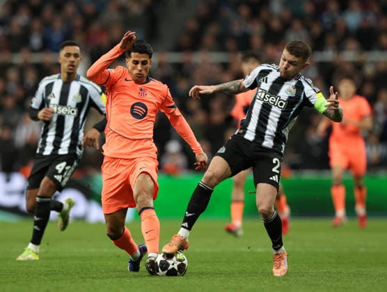 Newcastle Upon Tyne, England, 10th March 2026. Joao Cancelo of FC Barcelona, Barca tackles Kieran Trippier of Newcastle United during the Newcastle United vs FC Barcelona UEFA Champions League match at St. James Park, Newcastle Upon Tyne. Picture credit should read: Nigel Roddis Sportimage EDITORIAL USE ONLY. No use with unauthorised audio, video, data, fixture lists, club league logos or live services. Online in-match use limited to 120 images, no video emulation. No use in betting, games or single club league player publications. SPI_043_NR_NEWC_BARCx SPI-4596-0043