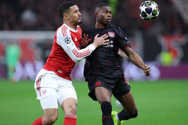 GER, UEFA CL, Round of 16, Bayer 04 Leverkusen GER vs FC Arsenal ENG , 11 03 2026, BayArena, Leverkusen, GER, UEFA CL, Round of 16, Bayer 04 Leverkusen GER vs FC Arsenal ENG , , in the picture Christian Kofane Leverkusen 35 , in a duel against William Saliba FC Arsenal 2 , nordphotoxGmbHx xMeuter nph00351