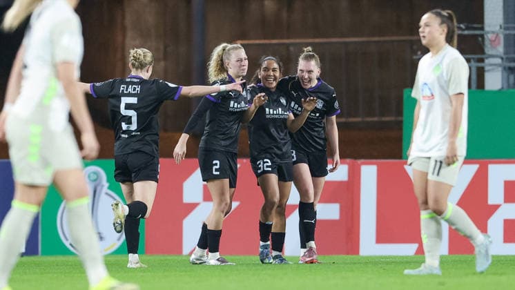 from left Paula Flach SGS Essen, 5 , Julie Terlinden SGS Essen, 2 , goal scorer Ella Touon SGS Essen, 32 and Maike Berentzen SGS Essen, 13 with goal celebration, cheering, jubilant, optimistic, game scene, highlight, joy about the goal for 1 0, THE DFB REGULATIONS PROHIBIT ANY USE OF PHOTOGRAPHS AS IMAGE SEQUENCES AND OR QUASI VIDEO , 11 03 2026, Essen Germany , Football, DFB Cup Women, SGS Essen SV Werder Bremen xobx