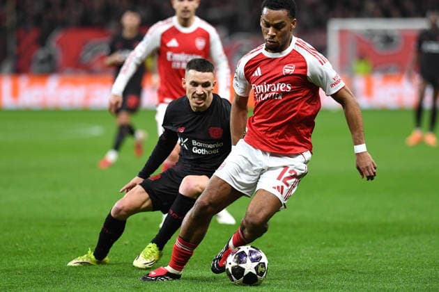 Alejandro Grimaldo Bayer 04 Leverkusen and Jurrien Timber FC Arsenal battle for the ball during the UEFA Champions League 2025 26, Round of 16, First leg match between Bayer 04 Leverkusen and FC Arsenal, BayArena on March 11, 2026 in Leverkusen, Germany, Germany Photo by Ralf Treese DeFodi Images Alejandro Grimaldo Bayer 04 Leverkusen and Jurrien Timber FC Arsenal battle for the ball during the UEFA Champions League 2025 26 Round of 16, First Leg, match between Bayer 04 Leverkusen and FC Arsenal at BayArena on February 24, 2026 in Leverkusen, Germany Photo by Ralf Treese DeFodi Images