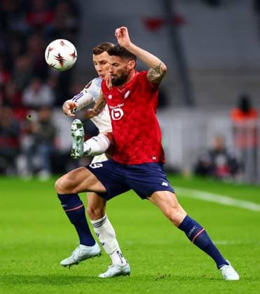 Lucas Digne of Aston Villa and Olivier Giroud of Lille. Lille v Aston Villa, UEFA Europa League, Round of 16, First Leg, Football, Stade Pierre-Mauroy, Lille, France - 12 Mar 2026Lille Stade Pierre-Mauroy France EDITORIAL USE ONLY No use with unauthorised audio, video, data, fixture lists, club league logos or live services. Online in-match use limited to 120 images, no video emulation. No use in betting, games or single club league player publications. Copyright: xJamesxMarsh Shutterstockx 16746748aq