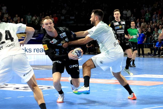 DEU, Machineseeker EHF Champions League, Fuechse Berlin vs HBC Nantes, 12 03 2026, Max Schmeling Halle, Berlin, DEU, Machineseeker EHF Champions League, Fuechse Berlin vs HBC Nantes, in the picture Mathias Gidsel Fuechse Berlin 19 , Ian Tarrafeta HBC Nantes 6 nordphotoxGmbHx xEngler nph00076