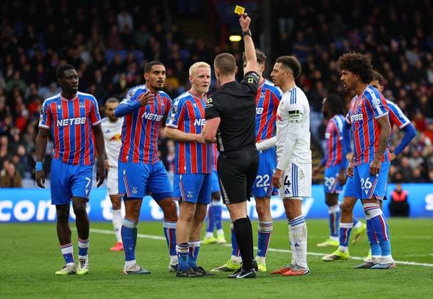 Will Hughes of Crystal Palace is shown a yellow card for a handball Crystal Palace v Leeds United, Premier League, Football, Selhurst Park, London, UK - 15 Mar 2026London Selhurst Park United Kingdom EDITORIAL USE ONLY No use with unauthorised audio, video, data, fixture lists, club league logos or live services. Online in-match use limited to 120 images, no video emulation. No use in betting, games or single club league player publications. Copyright: xMichaelxZemanek Shutterstockx 16757310s