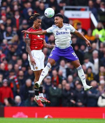 Leny Yoro of Manchester United, ManU and Ollie Watkins of Aston Villa Manchester United v Aston Villa, Premier League, Football, Old Trafford, Manchester, UK - 15 Mar 2026Manchester Old Trafford United Kingdom EDITORIAL USE ONLY No use with unauthorised audio, video, data, fixture lists, club league logos or live services. Online in-match use limited to 120 images, no video emulation. No use in betting, games or single club league player publications. Copyright: xMattxWest Shutterstockx 16757312r