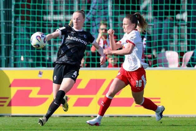 Meret Felde SC Freiburg and Annabel Schasching RB Leipzig battle for the ball, Google Pixel Frauen Bundesliga, RB Leipzig v SC Freiburg, RB Trainingszentrum, March 22, 2026 in Leipzig, Germany Photo by Marco Steinbrenner DeFodi Images Meret Felde SC Freiburg and Annabel Schasching RB Leipzig battle for the ball, Google Pixel Womens Bundesliga, RB Leipzig v SC Freiburg, RB Training Center, March 22, 2026 in Leipzig, Germany Photo by Marco Steinbrenner DeFodi Images DFB DFL REGULATIONS PROHIBIT ANY USE OF PHOTOGRAPHS AS IMAGE SEQUENCES AND OR QUASI VIDEO