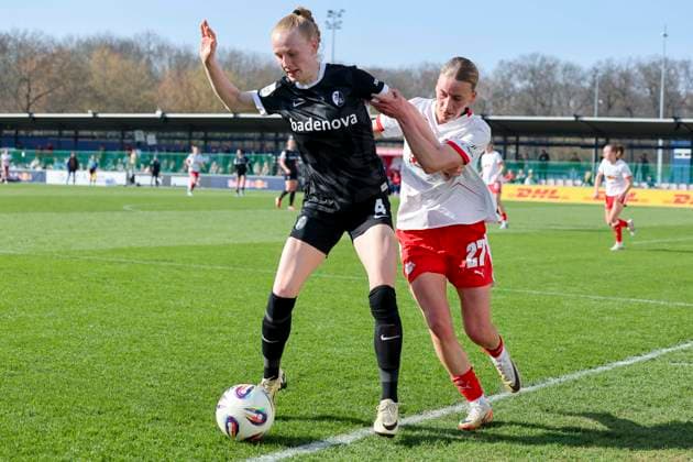 Meret Felde SC Freiburg and Marlene Mueller RB Leipzig battle for the ball, Google Pixel Frauen Bundesliga, RB Leipzig v SC Freiburg, RB Trainingszentrum, March 22, 2026 in Leipzig, Germany Photo by Marco Steinbrenner DeFodi Images Meret Felde SC Freiburg and Marlene Mueller RB Leipzig battle for the ball, Google Pixel Womens Bundesliga, RB Leipzig v SC Freiburg, RB Training Center, March 22, 2026 in Leipzig, Germany Photo by Marco Steinbrenner DeFodi Images DFB DFL REGULATIONS PROHIBIT ANY USE OF PHOTOGRAPHS AS IMAGE SEQUENCES AND OR QUASI VIDEO