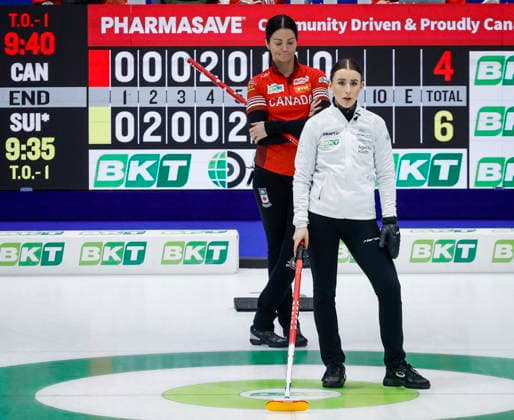 March 22, 2026, Calgary, Ab, CANADA: Team Canada skip Kerri Einarson, left, watches as Switzerland s directs her teammates at the World Women™s Curling Championship in Calgary, Sunday, March 22, 2026. Kerri Einarson, Xenia Schwaller - ZUMAc35_ 20260322_zaf_c35_027 Copyright: xJeffxMcintoshx