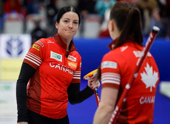 March 22, 2026, Calgary, Ab, CANADA: Canada skip Kerri Einarson, left, reacts with second Shannon Birchard after losing to Switzerland in the gold medal draw at the World WomenöÄÃ s Curling Championship in Calgary, Sunday, March 22, 2026. Kerri Einarson, Shannon Birchard - ZUMAc35_ 20260322_zaf_c35_040 Copyright: xJeffxMcintoshx