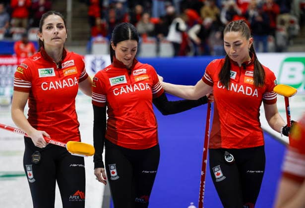 March 22, 2026, Calgary, Ab, CANADA: Canada skip Kerri Einarson, centre, reacts after losing to Switzerland with second Shannon Birchard, left, and lead Karlee Burgess, in the gold medal draw at the World WomenöÄÃ s Curling Championship in Calgary, Sunday, March 22, 2026. Kerri Einarson, Shannon Birchard, Karlee Burgess - ZUMAc35_ 20260322_zaf_c35_041 Copyright: xJeffxMcintoshx