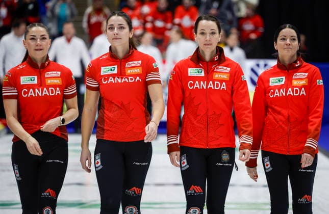 March 22, 2026, Calgary, Ab, CANADA: Canada lead Karlee Burgess, left to right, second Shannon Birchard, third Val Sweeting and skip Kerri Einarson walk down the ice sheet after losing the gold medal game to Switzerland at the World WomenöÄÃ s Curling Championship in Calgary, Sunday, March 22, 2026. Kerri Einarson, Karlee Burgess, Shannon Birchard, Val Sweeting - ZUMAc35_ 20260322_zaf_c35_047 Copyright: xJeffxMcintoshx