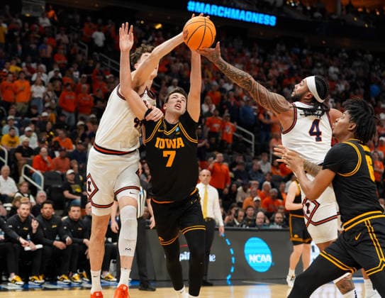 March 28, 2026, Houston, Texas, USA: Illinois center ZVONIMIR IVISIC (44), Iowa forward ALVARO FOLGUEIRAS (7), and Illinois guard KYLAN BOSWELL (4) reach for a rebound during the NCAA, College League, USA Menâ€⠢s Basketball Tournament Elite Eight game between the Illinois Fighting Illini and the Iowa Hawkeyes on March 28, 2026 in Houston, Texas. Illinois won, 71-59. Houston USA - ZUMAc201 20260328_zap_c201_048 Copyright: xScottxColemanx
