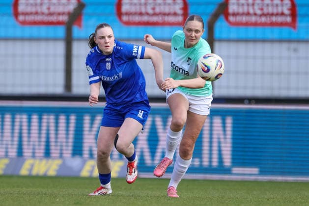 from left Marleen Kropp SV Meppen, 9 and Ronja Schaer SC Sand, 13 in a duel, dynamic, action, action, game scene, THE DFB REGULATIONS PROHIBIT ANY USE OF PHOTOGRAPHS AS IMAGE SEQUENCES AND OR QUASI VIDEO , 04 04 2026, Meppen Germany , Football, 2 Womens Bundesliga, SV Meppen SC Sand xobx