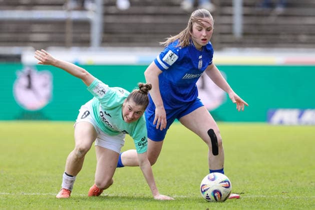 from left Kim Schneider SC Sand, 8 and Marleen Kropp SV Meppen, 9 in a duel, dynamic, action, action, game scene, THE DFB REGULATIONS PROHIBIT ANY USE OF PHOTOGRAPHS AS IMAGE SEQUENCES AND OR QUASI VIDEO , 04 04 2026, Meppen Germany , Football, 2 Womens Bundesliga, SV Meppen SC Sand xobx