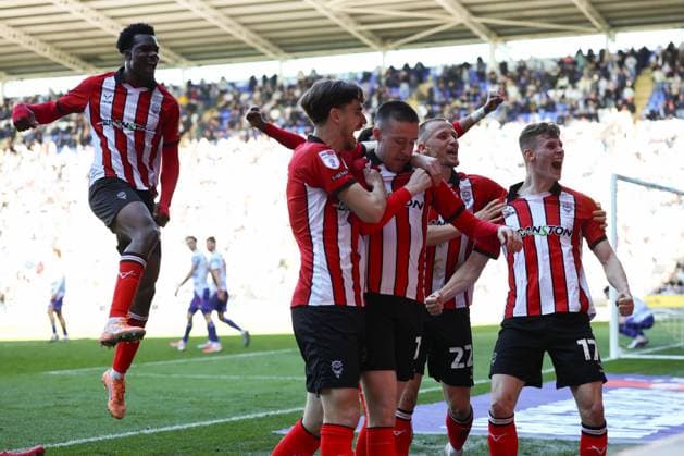 Jack Moylan of Lincoln City celebrates after scoring a goal (1-2) Reading v Lincoln City, Sky Bet League One, Football, Select Car Leasing Stadium, Reading, UK - 06 Apr 2026Reading Select Car Leasing Stadium United Kingdom EDITORIAL USE ONLY No use with unauthorised audio, video, data, fixture lists, club league logos or live services. Online in-match use limited to 120 images, no video emulation. No use in betting, games or single club league player publications. Copyright: xSimonxDael Shutterstockx 16811828bv