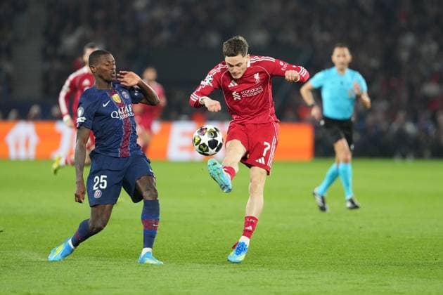Florian Wirtz of Liverpool and Nuno Mendes of PSG Paris Saint-Germain v Liverpool, UEFA Champions League, Quarter Final, First Leg, Football, Parc des Princes, Paris, France - 08 Apr 2026Paris Parc des Princes France EDITORIAL USE ONLY No use with unauthorised audio, video, data, fixture lists, club league logos or live services. Online in-match use limited to 120 images, no video emulation. No use in betting, games or single club league player publications. Copyright: xDavexWinter Shutterstockx 16811861cb