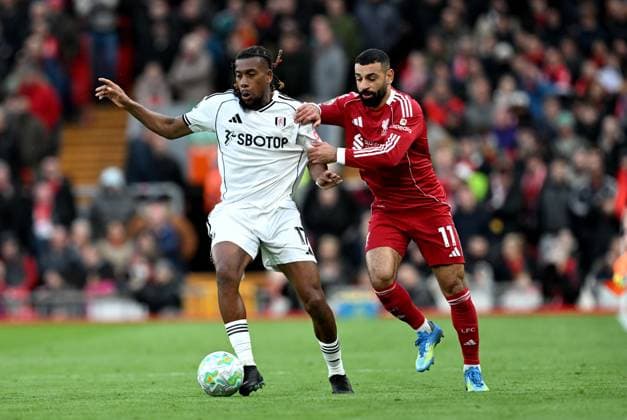 Alex Iwobi of Fulham and Mohamed Salah of Liverpool Liverpool v Fulham, Premier League, Football, Anfield, Liverpool, UK - 11 Apr 2026Liverpool Anfield United Kingdom EDITORIAL USE ONLY No use with unauthorised audio, video, data, fixture lists, club league logos or live services. Online in-match use limited to 120 images, no video emulation. No use in betting, games or single club league player publications. Copyright: xAnnaxGowthorpe Shutterstockx 16823590bi