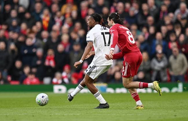 Alex Iwobi of Fulham and Dominik Szoboszlai of Liverpool Liverpool v Fulham, Premier League, Football, Anfield, Liverpool, UK - 11 Apr 2026Liverpool Anfield United Kingdom EDITORIAL USE ONLY No use with unauthorised audio, video, data, fixture lists, club league logos or live services. Online in-match use limited to 120 images, no video emulation. No use in betting, games or single club league player publications. Copyright: xAnnaxGowthorpe Shutterstockx 16823590ce