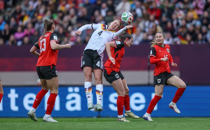 GER, Nuremberg, Germany vs. Austria, international match, football, FIFA, 2026 2027 season, World Cup qualification, Max Morlock Stadium, 3 Matchday in picture f l Rebecca Knaak Germany Women 4 , Claudia Wenger Austria 5 DFB DFL REGULATIONS PROHIBIT ANY USE OF PHOTOGRAPHS AS IMAGE SEQUENCES AND OR QUASI VIDEO, 14 04 2026 Copyright: HMBxMedia HendrikxHamelau