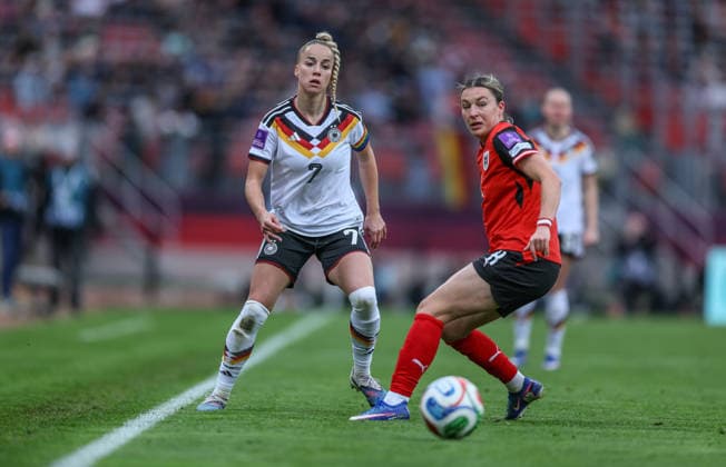 GER, Nuremberg, Germany vs. Austria, international match, football, FIFA, 2026 2027 season, World Cup qualification, Max Morlock Stadium, 3 matchday in picture f l Giulia Gwinn Germany Women 7 , Barbara Dunst Austria 8 DFB DFL REGULATIONS PROHIBIT ANY USE OF PHOTOGRAPHS AS IMAGE SEQUENCES AND OR QUASI VIDEO, 14 04 2026 Copyright: HMBxMedia HendrikxHamelau