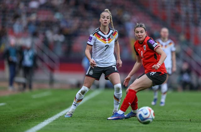GER, Nuremberg, Germany vs. Austria, international match, football, FIFA, 2026 2027 season, World Cup qualification, Max Morlock Stadium, 3 matchday in picture f l Giulia Gwinn Germany Women 7 , Barbara Dunst Austria 8 DFB DFL REGULATIONS PROHIBIT ANY USE OF PHOTOGRAPHS AS IMAGE SEQUENCES AND OR QUASI VIDEO, 14 04 2026 Copyright: HMBxMedia HendrikxHamelau