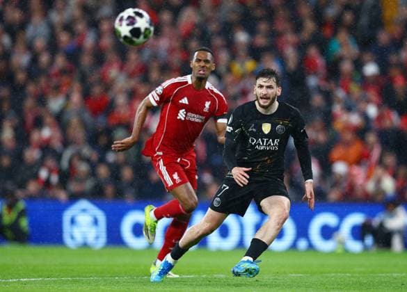 Khvicha Kvaratskhelia of Paris Saint Germain and Ryan Gravenberch of Liverpool Liverpool v Paris Saint-Germain, UEFA Champions League, Quarter Final, Second Leg, Football, Anfield, Liverpool, UK - 14 Apr 2026Liverpool Anfield France EDITORIAL USE ONLY No use with unauthorised audio, video, data, fixture lists, club league logos or live services. Online in-match use limited to 120 images, no video emulation. No use in betting, games or single club league player publications. Copyright: xMattxWest Shutterstockx 16828520al