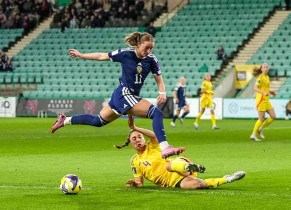 Kathleen McGovern of Scotland Women tackled by Amber Tysiak of Belgium Women. Scotland Women v Belgium Women, FIFA 2027 Women s World Cup Qualifying, Football, Easter Road, Edinburgh, UK - 14 Apr 2026Edinburgh Easter Road United Kingdom EDITORIAL USE ONLY No use with unauthorised audio, video, data, fixture lists, club league logos or live services. Online in-match use limited to 120 images, no video emulation. No use in betting, games or single club league player publications. Copyright: xStuartxWallace Shutterstockx 16828526at