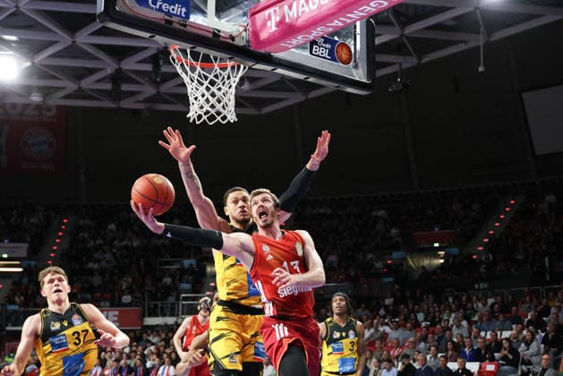 Andreas Obst FC Bayern Basketball, 13 with Gavin Schilling MHP Riesen Ludwigsburg, 34 , GER, FC Bayern Basketball vs MHP Riesen Ludwigsburg, Basketball, easycredit Basketball Bundesliga, 13 Matchday, Season 2025 2026, 14 04 2026, GER, FC Bayern Basketball vs MHP Riesen Ludwigsburg, Basketball, easycredit Basketball Bundesliga, 13 Matchday, Season 2025 2026, 14 04 2026 Munich Copyright: xEibner-Pressefoto JennixMaulx EP_JML