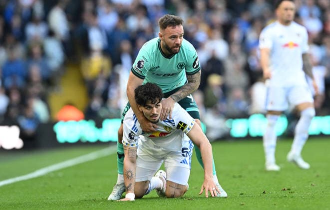 Adam Armstrong of Wolverhampton Wanderers piggy backs Pascal Struijk of Leeds United Leeds United v Wolverhampton Wanderers, Premier League, Football, Elland Road, Leeds, UK - 18 Apr 2026Leeds Elland Road United Kingdom EDITORIAL USE ONLY No use with unauthorised audio, video, data, fixture lists, club league logos or live services. Online in-match use limited to 120 images, no video emulation. No use in betting, games or single club league player publications. Copyright: xGreigxCowie Shutterstockx 16832140aj