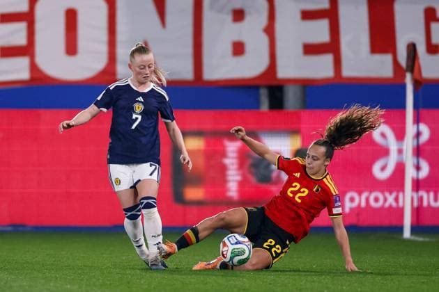 Freya Gregory of Scotland Women passes the ball past a sliding Jasmin Mathys of Belgium Women Belgium Women v Scotland Women, FIFA 2027 Women s World Cup Qualifying, Football, The King Power At Den Dreef Stadium, Leuven, Belgium - 18 Apr 2026Leuven The King Power At Den Dreef Stad Belgium EDITORIAL USE ONLY No use with unauthorised audio, video, data, fixture lists, club league logos or live services. Online in-match use limited to 120 images, no video emulation. No use in betting, games or single club league player publications. Copyright: xMauricexvanxSteen Shutterstockx 16832024aq
