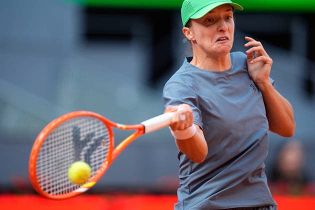 April 23, 2026, Madrid, Madrid, Spain: Iga Swiatek of Poland practices during the Mutua Madrid Open 2026, ATP, Tennis Herren Masters 1000 and WTA, Tennis Damen 1000, at La Caja Magica on April 23, 2026 in Madrid, Spain. Madrid Spain - ZUMAa181 20260423_zaa_a181_011 Copyright: xDennisxAgyemanx
