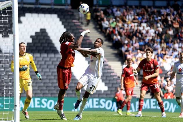 William Tamen of Tranmere Rovers clears the ball away from Marvin Ekpiteta of Milton Keynes Dons Milton Keynes Dons v Tranmere Rovers, EFL Sky Bet League Two, Football, Stadium MK, Milton Keynes, UK - 25 Apr 2026Milton Keynes Stadium MK United Kingdom EDITORIAL USE ONLY No use with unauthorised audio, video, data, fixture lists, club league logos or live services. Online in-match use limited to 120 images, no video emulation. No use in betting, games or single club league player publications. Copyright: xGeorgexTewkesbury Shutterstockx 16838787ad