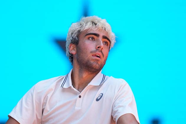 April 27, 2026, Madrid, Madrid, Spain: Daniel Merida of Spain in action against Stefanos Tsitsipas of Greece during the Mutua Madrid Open 2026, ATP, Tennis Herren Masters 1000 and WTA, Tennis Damen 1000, at La Caja Magica on April 27, 2026 in Madrid, Spain. Madrid Spain - ZUMAa181 20260427_zaa_a181_223 Copyright: xDennisxAgyemanx
