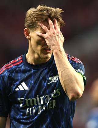Martin odegaard of Arsenal shows a look of dejection Atletico Madrid v Arsenal, UEFA Champions League, Semi Final, First Leg, Football, Riyadh Air Metropolitano, Madrid, Spain - 29 Apr 2026Madrid Riyadh Air Metropolitano Spain EDITORIAL USE ONLY No use with unauthorised audio, video, data, fixture lists, club league logos or live services. Online in-match use limited to 120 images, no video emulation. No use in betting, games or single club league player publications. Copyright: xKieranxMcManus Shutterstockx 16847970ac