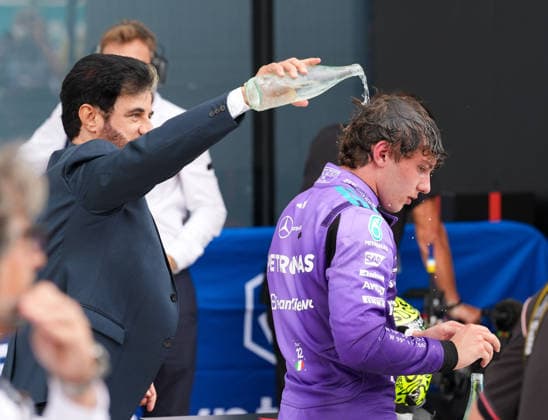 FIA President Mohammed Ben Sulayem pours water over Andrea Kimi Antonelli Mercedes AMG Petronas F1 Team, Italy, 12 after his victory in the race USA, Formula 1 World Championship, Miami Grand Prix, Miami International Autodrome, Miami Gardens, Race day, 2026 season, 03 05 2026 USA, Formula 1 World Championship, Miami Grand Prix, Miami International Autodrome, Miami Gardens, Race, 2026 season, 03 05 2026 Miami Gardens Copyright: xEibner-Pressefoto ScottxColemanx EP_SCN
