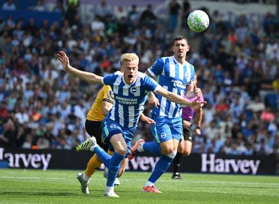 Jan Paul van Hecke of Brighton is sent to he ground by Adam Armstrong of Wolves during the Premier League match between Brighton and Hove Albion and Wolverhampton Wanderers at the American Express Stadium, Brighton UK - Saturday 9th May 2026 Brighton v Wolves Premier League Football, Amex Stadium, Sussex, UK - 09 May 2026Brighton Amex Stadium Sussex United Kingdom EDITORIAL USE ONLY No use with unauthorised audio, video, data, fixture lists, club league logos or live services. Online in-match use limited to 120 images, no video emulation. No use in betting, games or single club league player publications. . No mer Copyright: xLizxFinlayson TPI Shutterstockx 16867427as